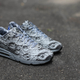 Illustration for article titled These lunar shoes make you feel like youre walking on the moon